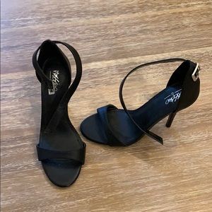 Never worn black stiletto heels